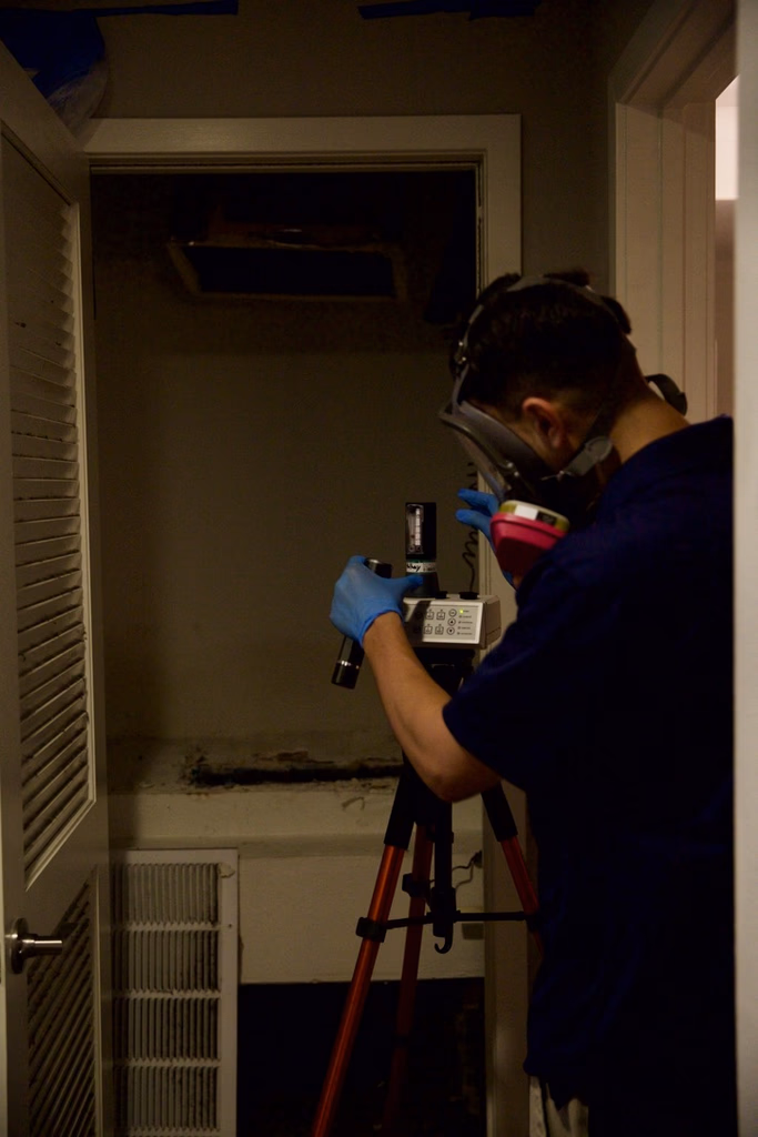 Technician with tripod