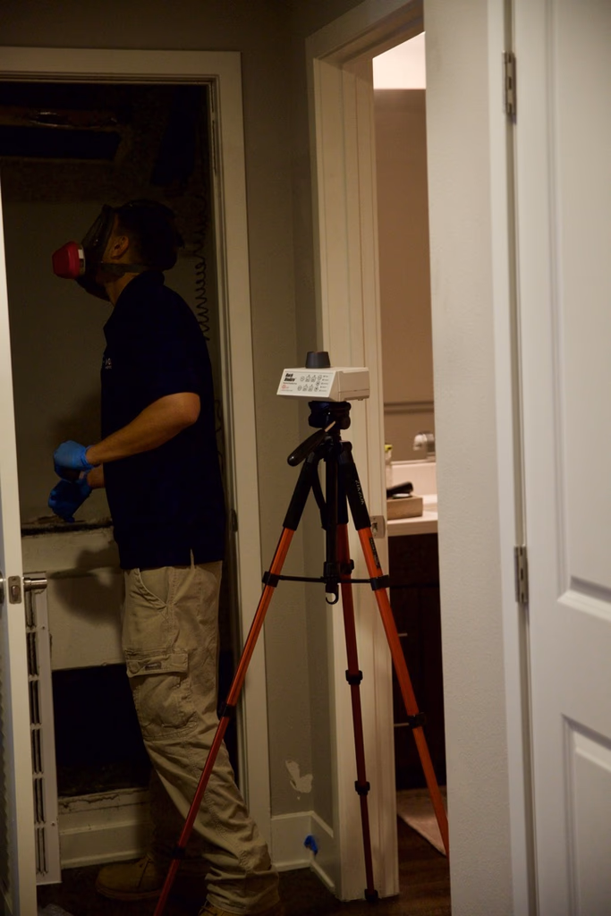 Inspector with tripod equipment